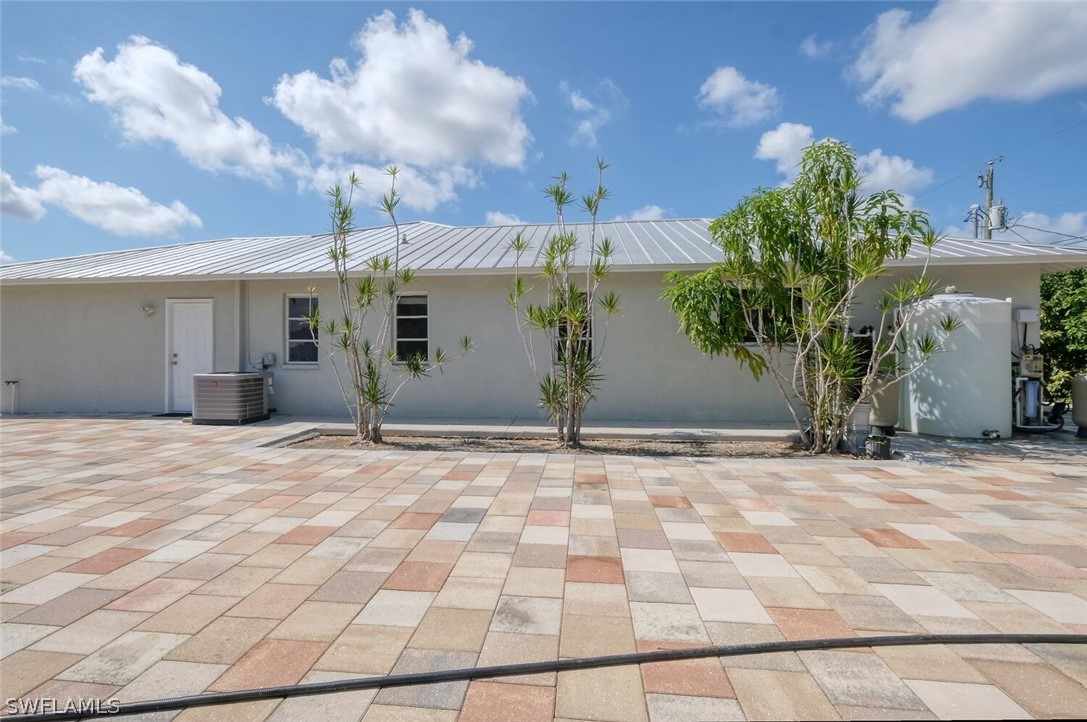 18246 Sycamore Road Fort Myers, FL 33967 - Photo 34 of 35 a view of a house with a patio
