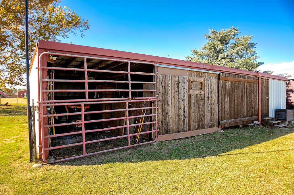 11661 Dane Road Pilot Point, TX 76258 - Photo 27 of 40 a view of an empty room with a garage