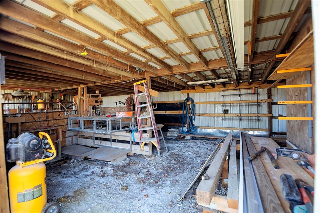 11661 Dane Road Pilot Point, TX 76258 - Photo 28 of 40 a view of storage and utility room