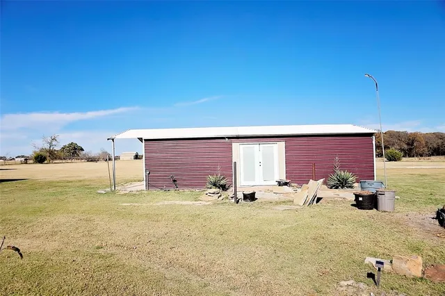 a view of a terrace with a lake view