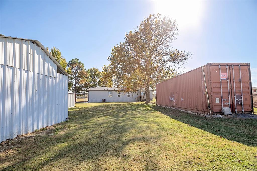 11661 Dane Road Pilot Point, TX 76258 - Photo 38 of 40 a view of a backyard of the house