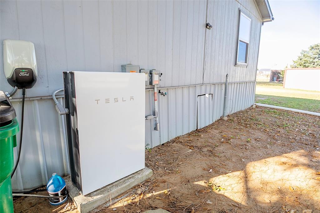 11661 Dane Road Pilot Point, TX 76258 - Photo 40 of 40 a view of a refrigerator in kitchen and a window