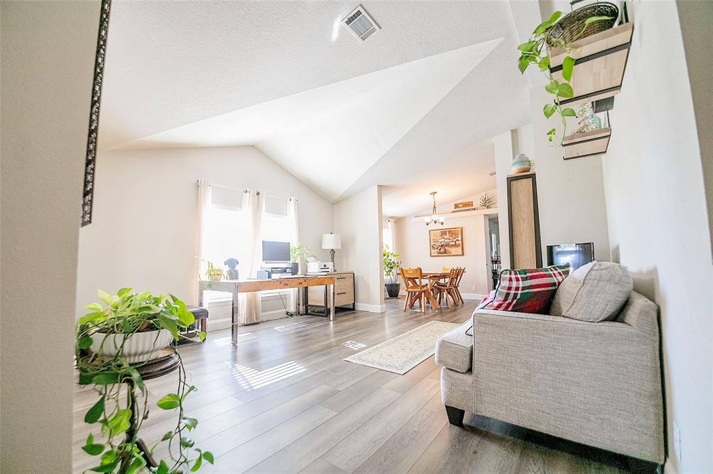 11661 Dane Road Pilot Point, TX 76258 - Photo 8 of 40 a living room with furniture and a large window