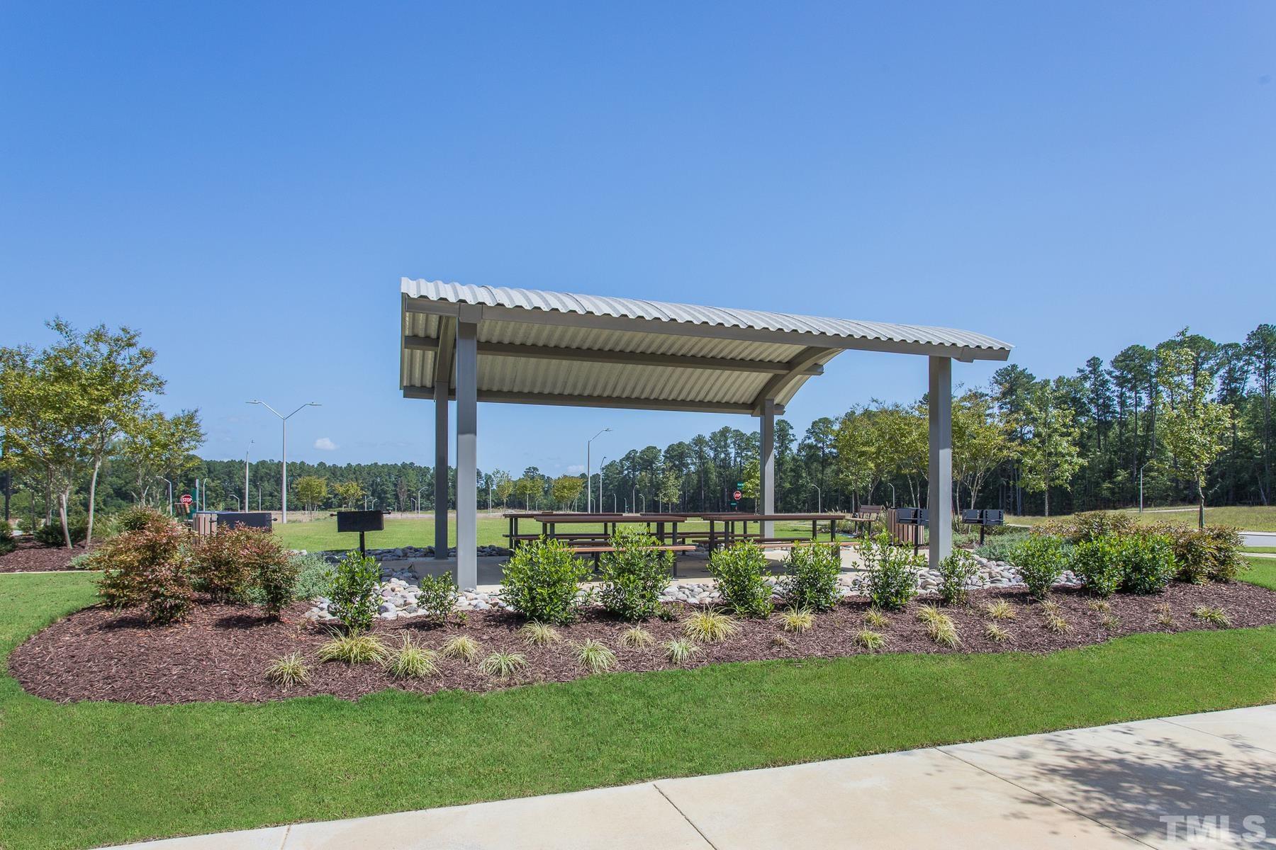 6936 Outfall Point Lane Raleigh, NC 27616 - Photo 6 of 9 a view of a house with backyard and porch