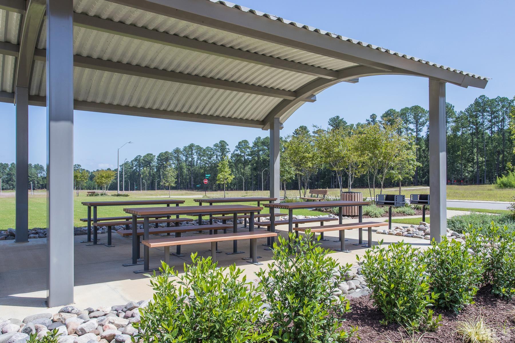 6936 Outfall Point Lane Raleigh, NC 27616 - Photo 7 of 9 a view of a chairs and table in the patio