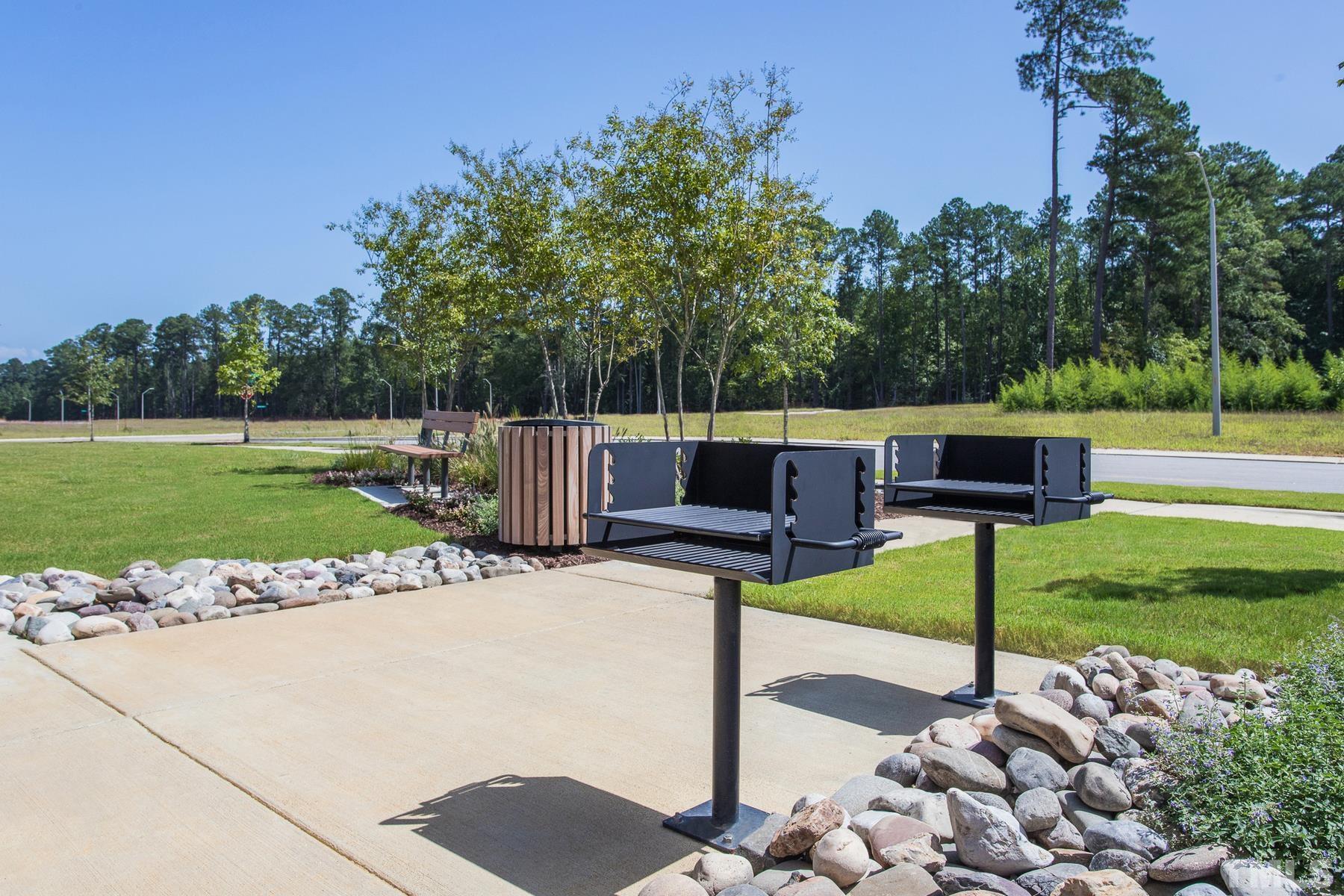 6936 Outfall Point Lane Raleigh, NC 27616 - Photo 8 of 9 a view of a park with iron fence