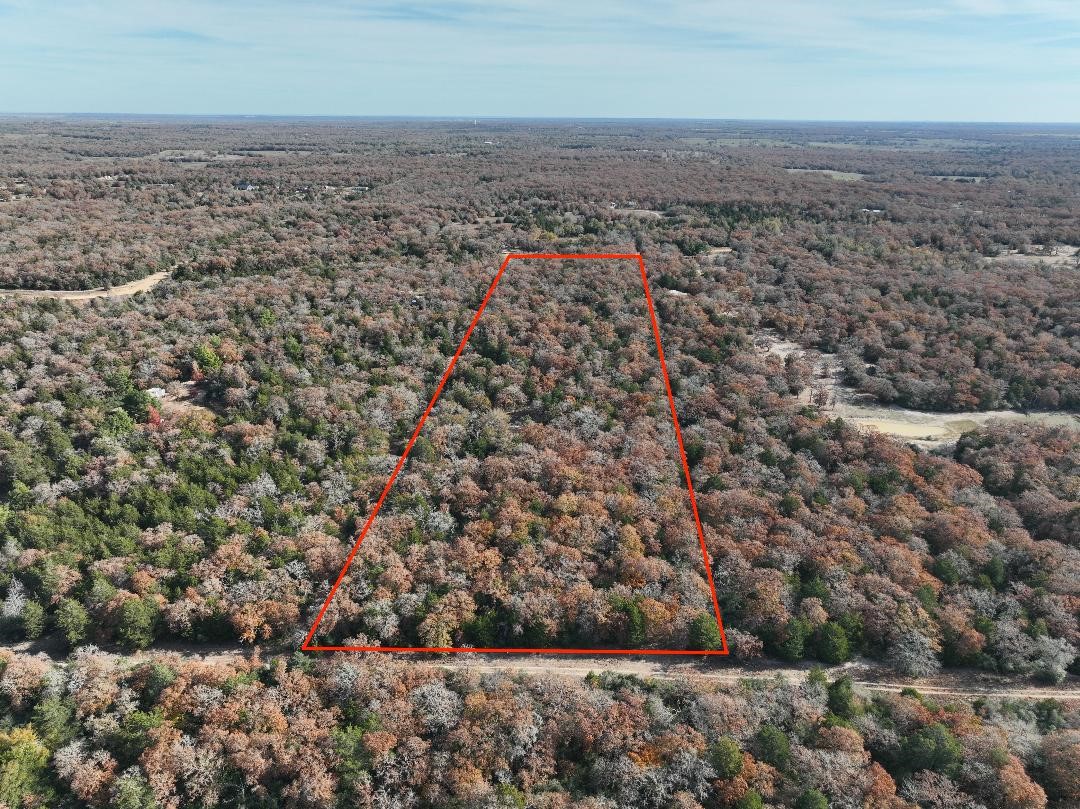 881 Cr 327 Road Rockdale, TX 76567 - Photo 6 of 8 an aerial view of house with yard and mountain in back