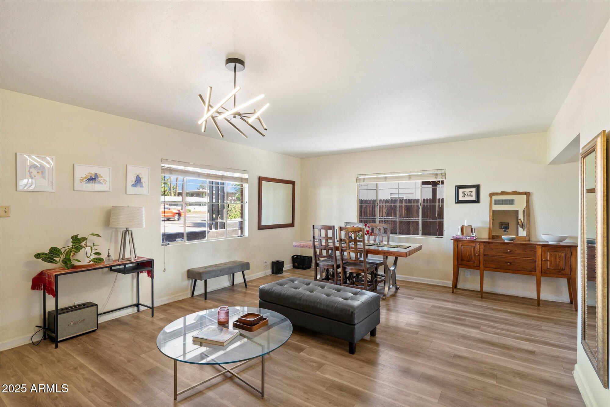 1405 East Osborn Road Phoenix, AZ 85014 - Photo 12 of 30 a living room with furniture and a wooden floor