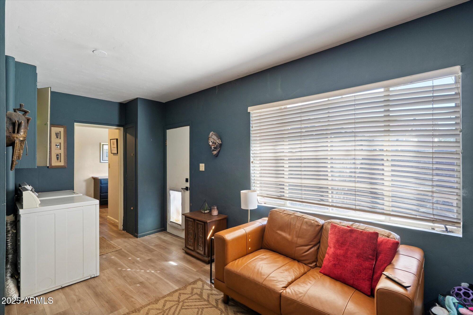 1405 East Osborn Road Phoenix, AZ 85014 - Photo 23 of 30 a living room with furniture and a window