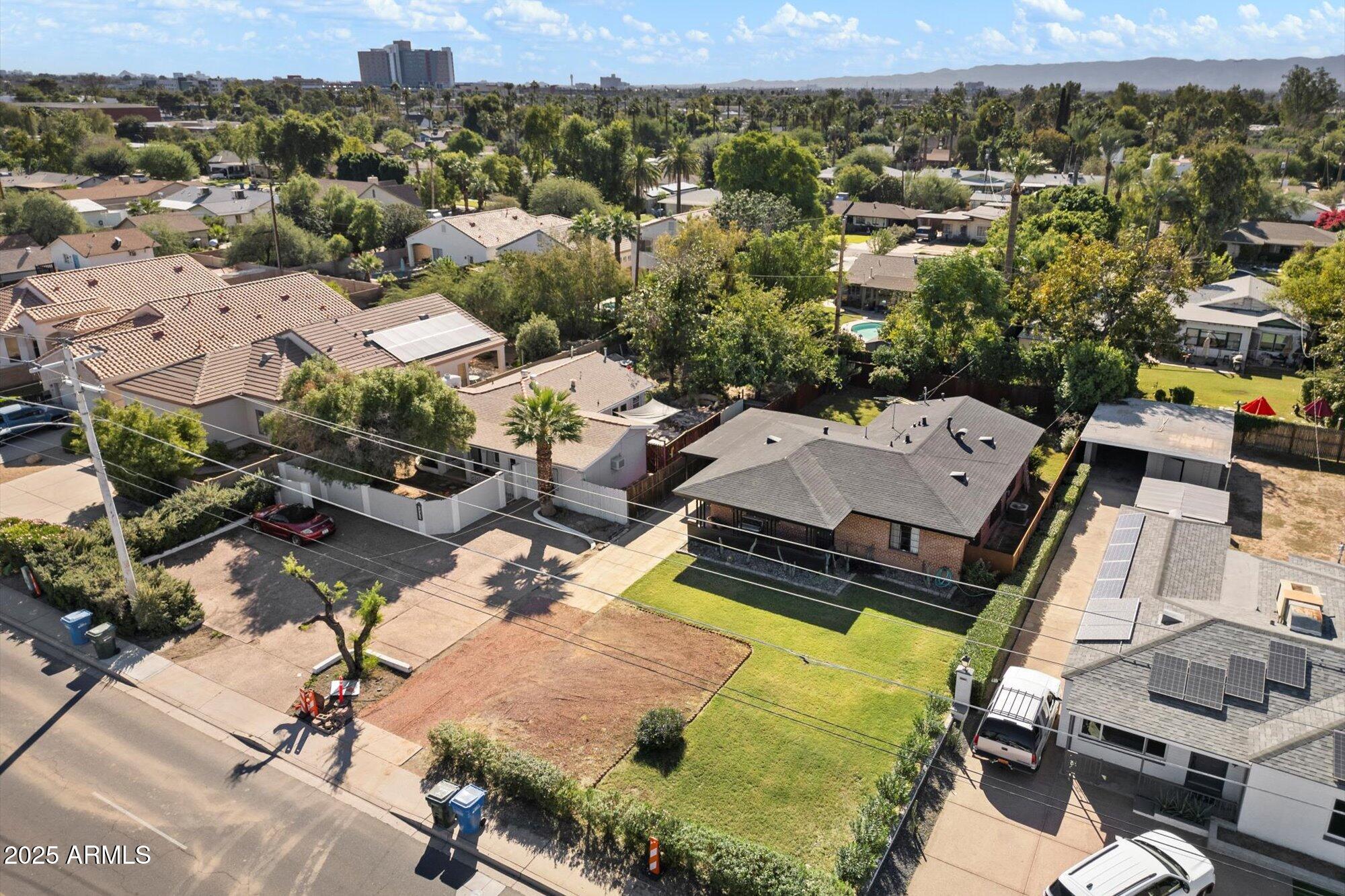 1405 East Osborn Road Phoenix, AZ 85014 - Photo 3 of 30 an aerial view of a house with a mountain