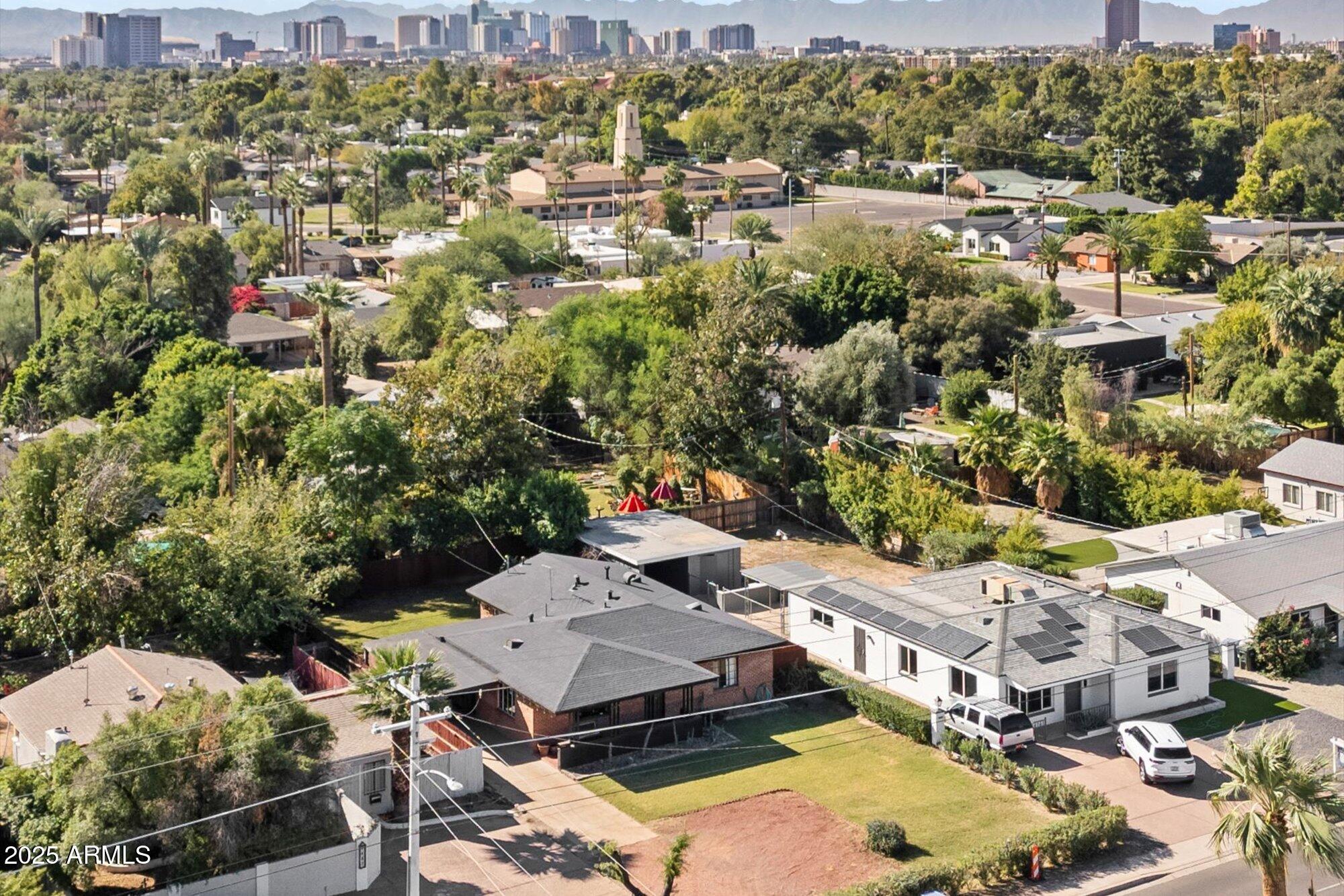 1405 East Osborn Road Phoenix, AZ 85014 - Photo 4 of 30 an aerial view of residential houses with outdoor space