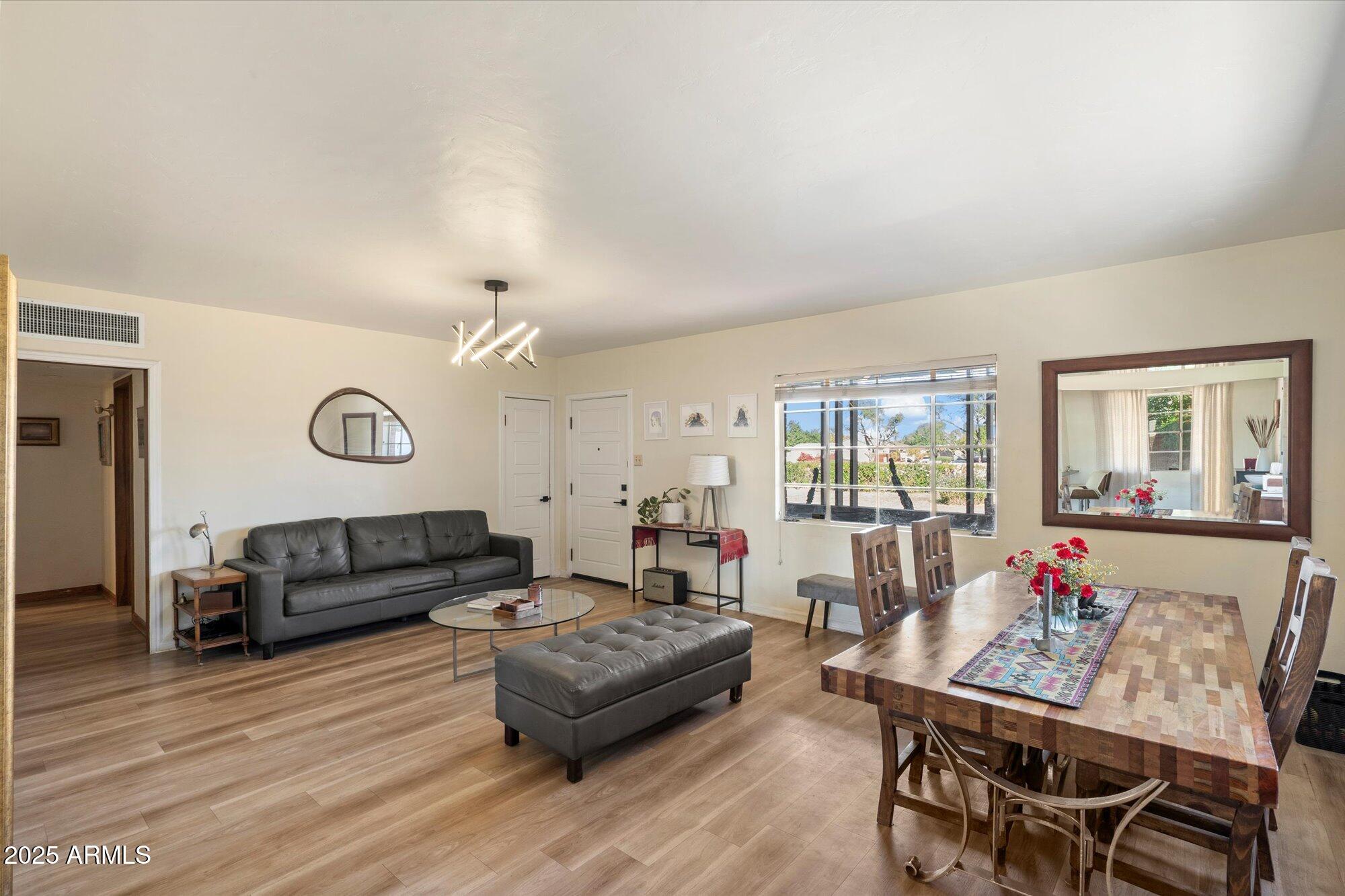 1405 East Osborn Road Phoenix, AZ 85014 - Photo 10 of 30 a living room with furniture and a large window