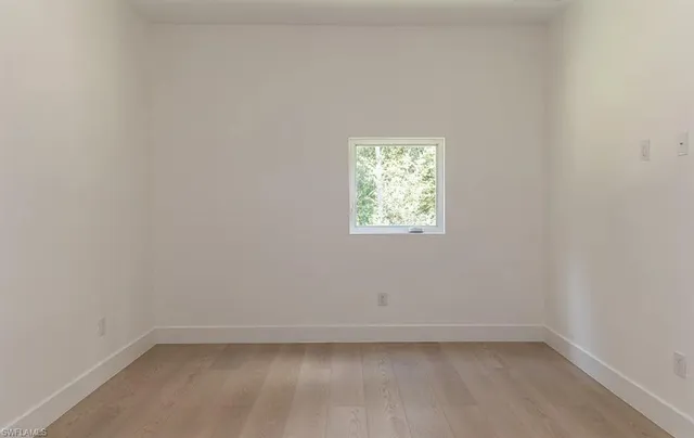 a bathroom with a toilet bathtub and shower