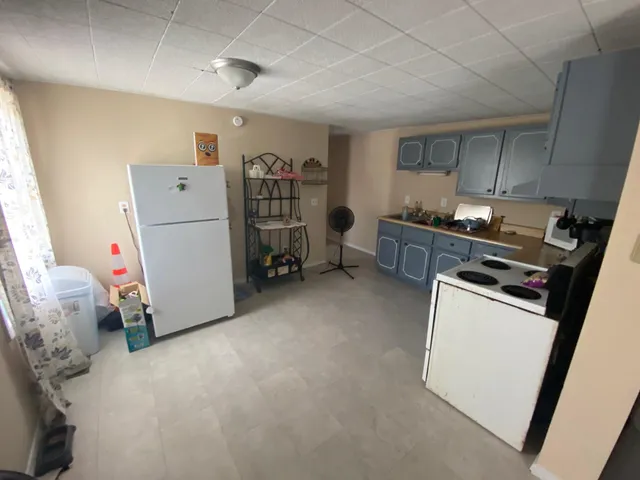 a room with furniture and a window