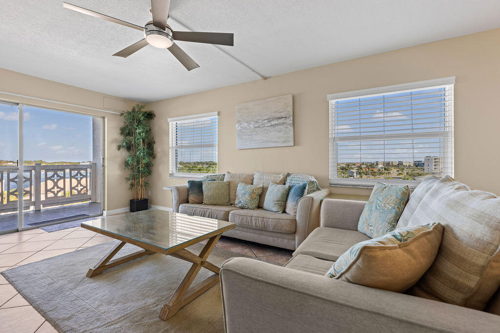 909 Santa Rosa Boulevard, Unit 569 Fort Walton Beach, FL 32548 - Photo 11 of 57 a living room with furniture and wooden floor