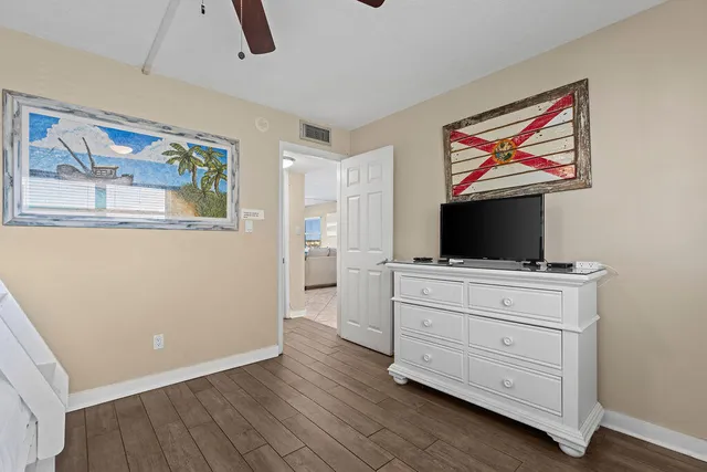 a kitchen with a stove top oven sink and cabinets