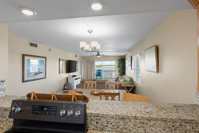 a view of a swimming pool with sitting area