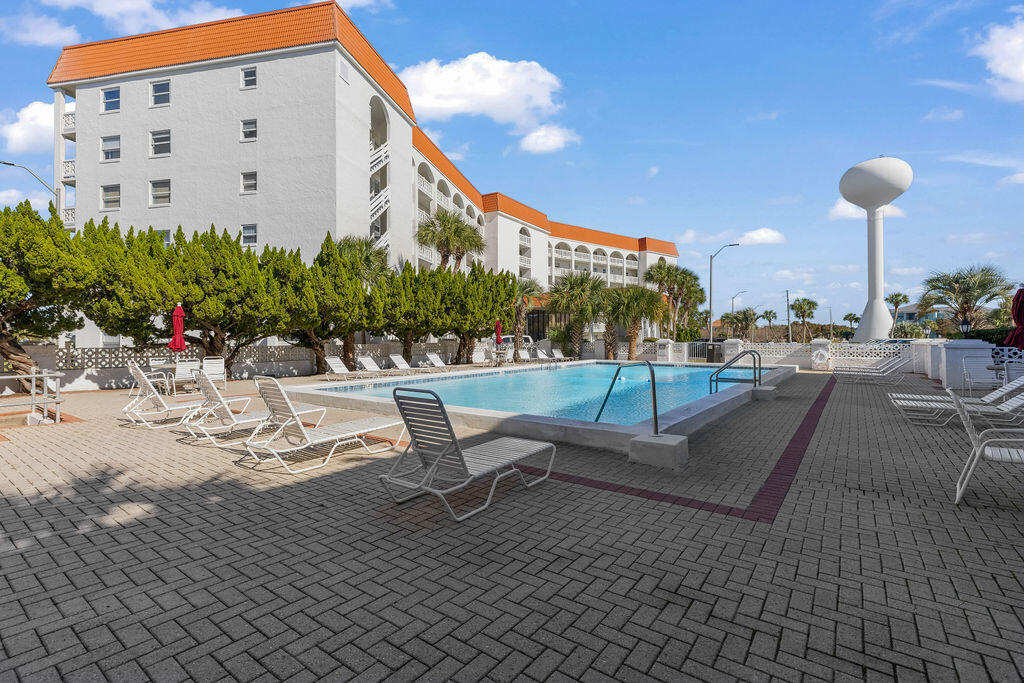 909 Santa Rosa Boulevard, Unit 569 Fort Walton Beach, FL 32548 - Photo 40 of 57 a view of a terrace with chairs
