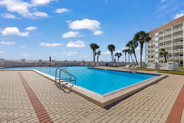 a view of a street with cars