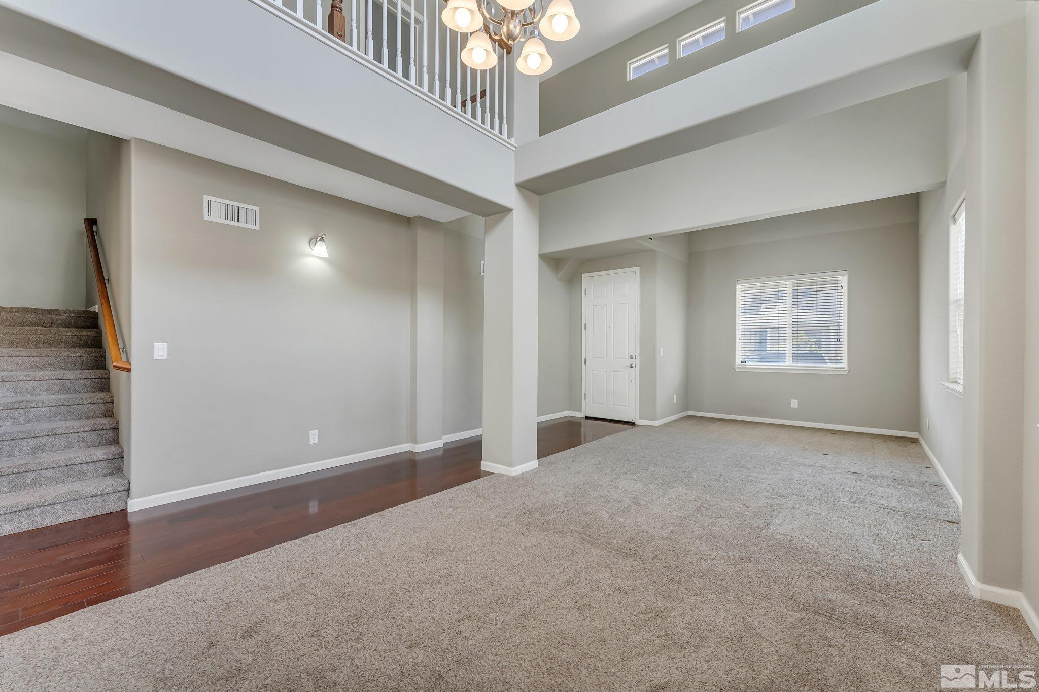 3720 Thistledown Court Reno, NV 89512 - Photo 3 of 8 an empty room with windows and closet