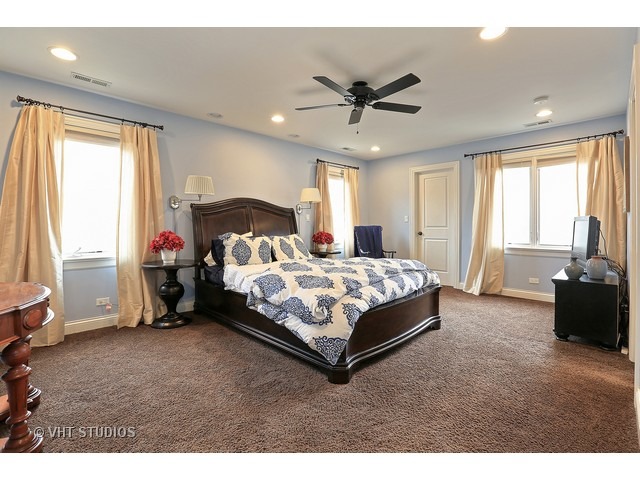 888 Spring Road Elmhurst, IL 60126 - Photo 11 of 22 a bedroom with a bed and a window