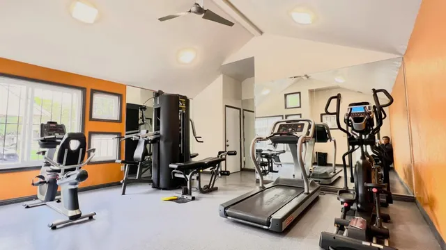 a view of a room with gym equipment