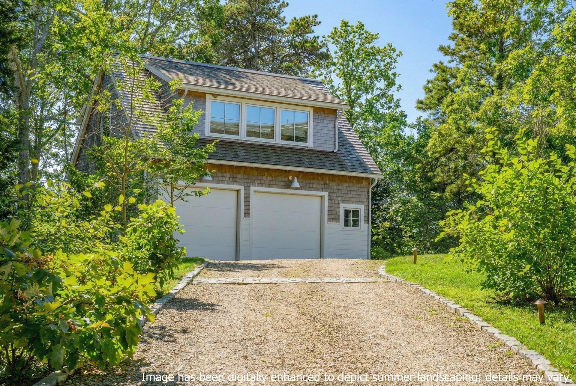 301 Whidah Road North Chatham, MA 02650 - Photo 40 of 52 a front view of house with yard and trees all around