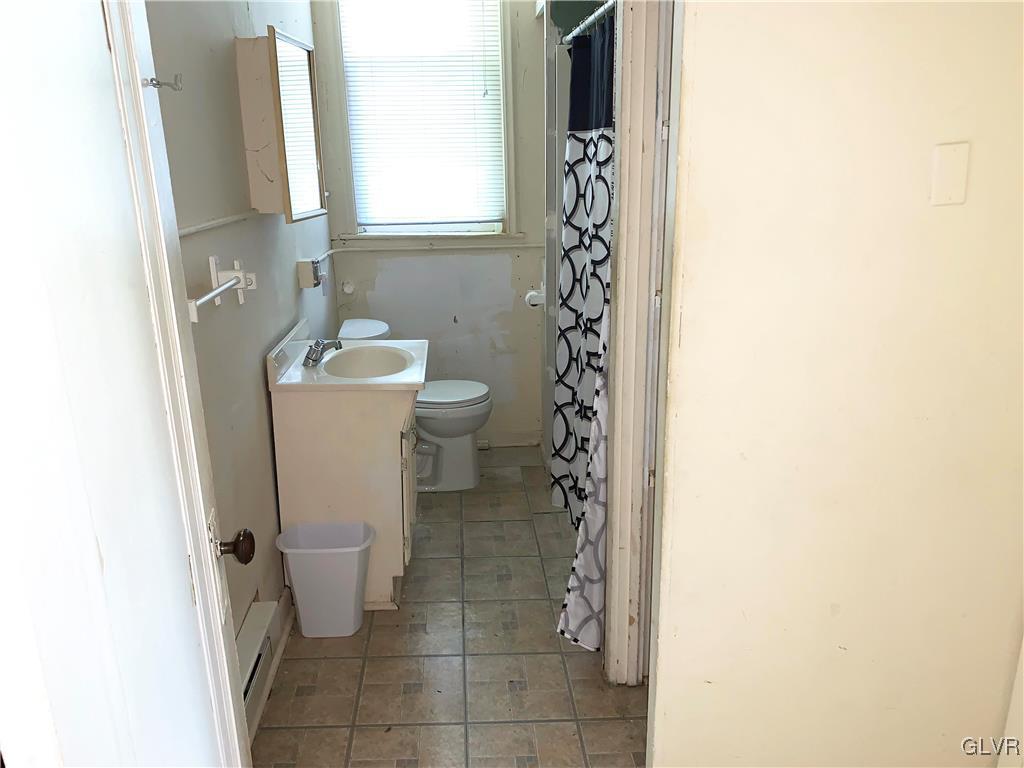 30 North Main Street Bangor, PA 18013 - Photo 11 of 13 a bathroom with a toilet and a sink