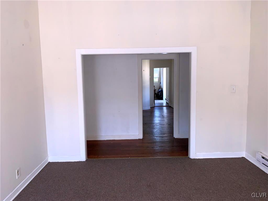 30 North Main Street Bangor, PA 18013 - Photo 8 of 13 an empty room with wooden floor and closet
