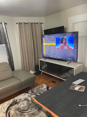 a living room with furniture and a couch