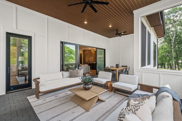 a view of a bathroom with a sink and mirror