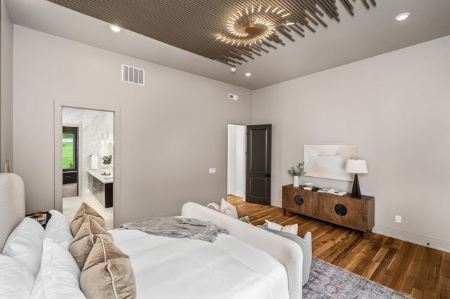 a kitchen with a sink and a refrigerator