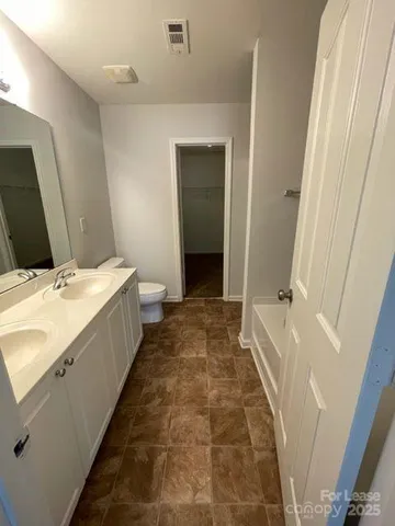 a close up of a bathtub in a bathroom