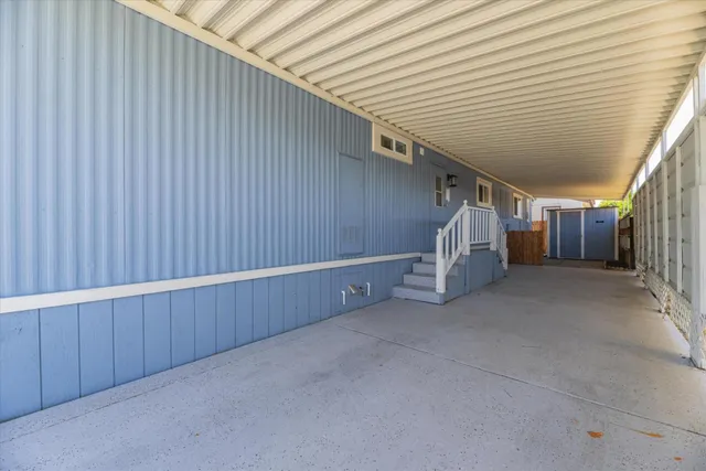 a view of a big room with staircase