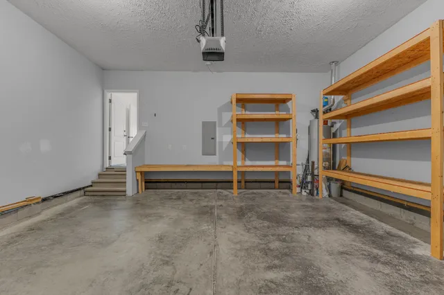 a view of a house with wooden deck