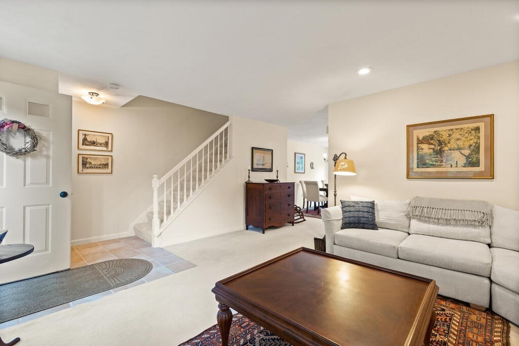 7 Apple Ridge Road, Unit 2 Maynard, MA 01754 - Photo 5 of 27 a living room with furniture and wooden floor