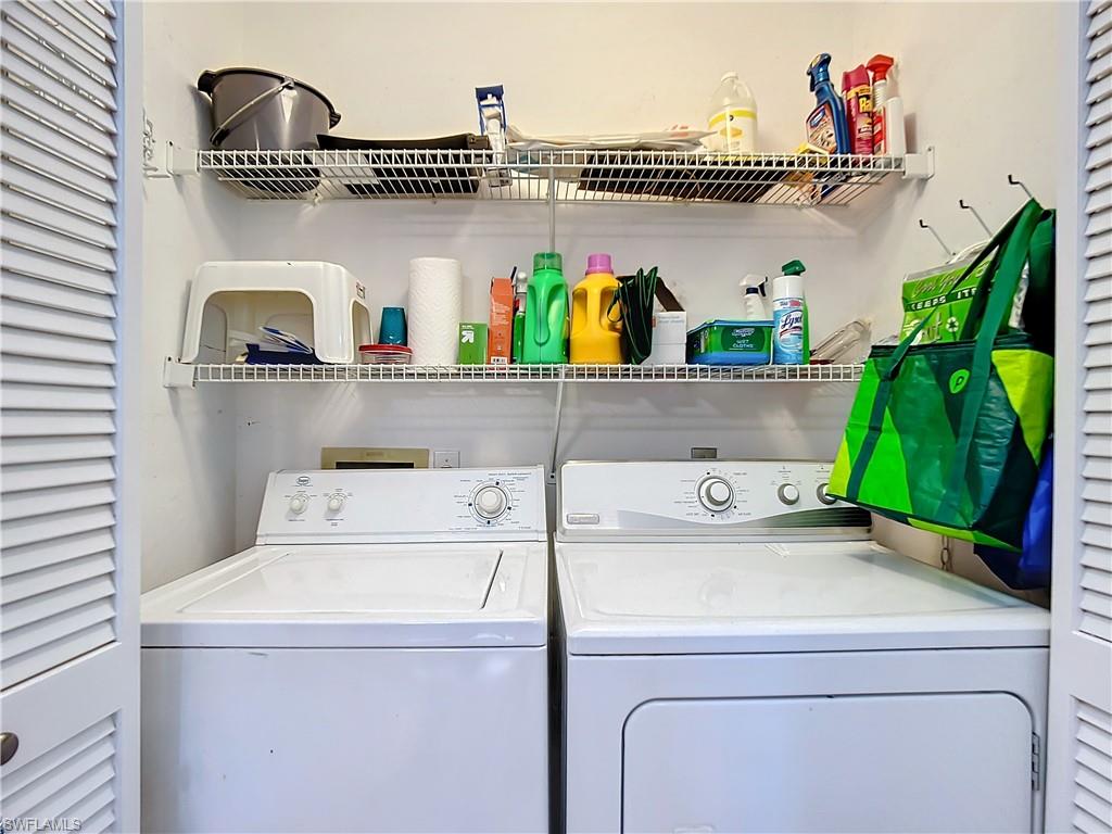 2860 Citrus Lake Drive, Unit R202 Naples, FL 34109 - Photo 41 of 50 a utility room with dryer and washer