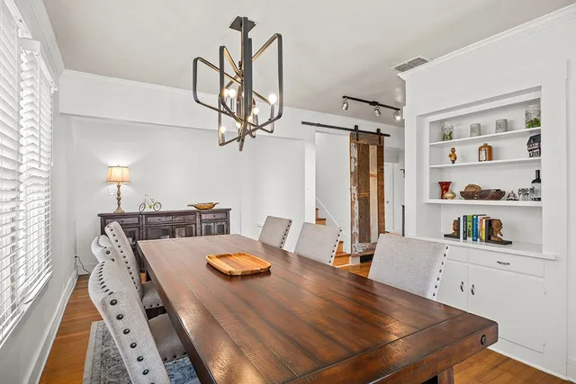 a view of a dining room with furniture