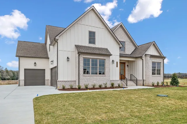 a front view of house with yard