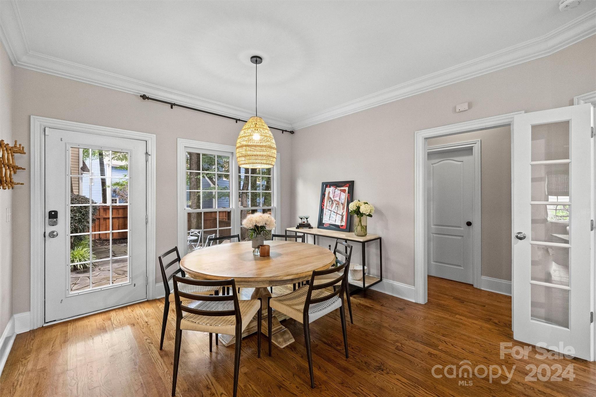 813 Millbrook Road Charlotte, NC 28211 - Photo 11 of 47 a view of a dining room with furniture window and wooden floor