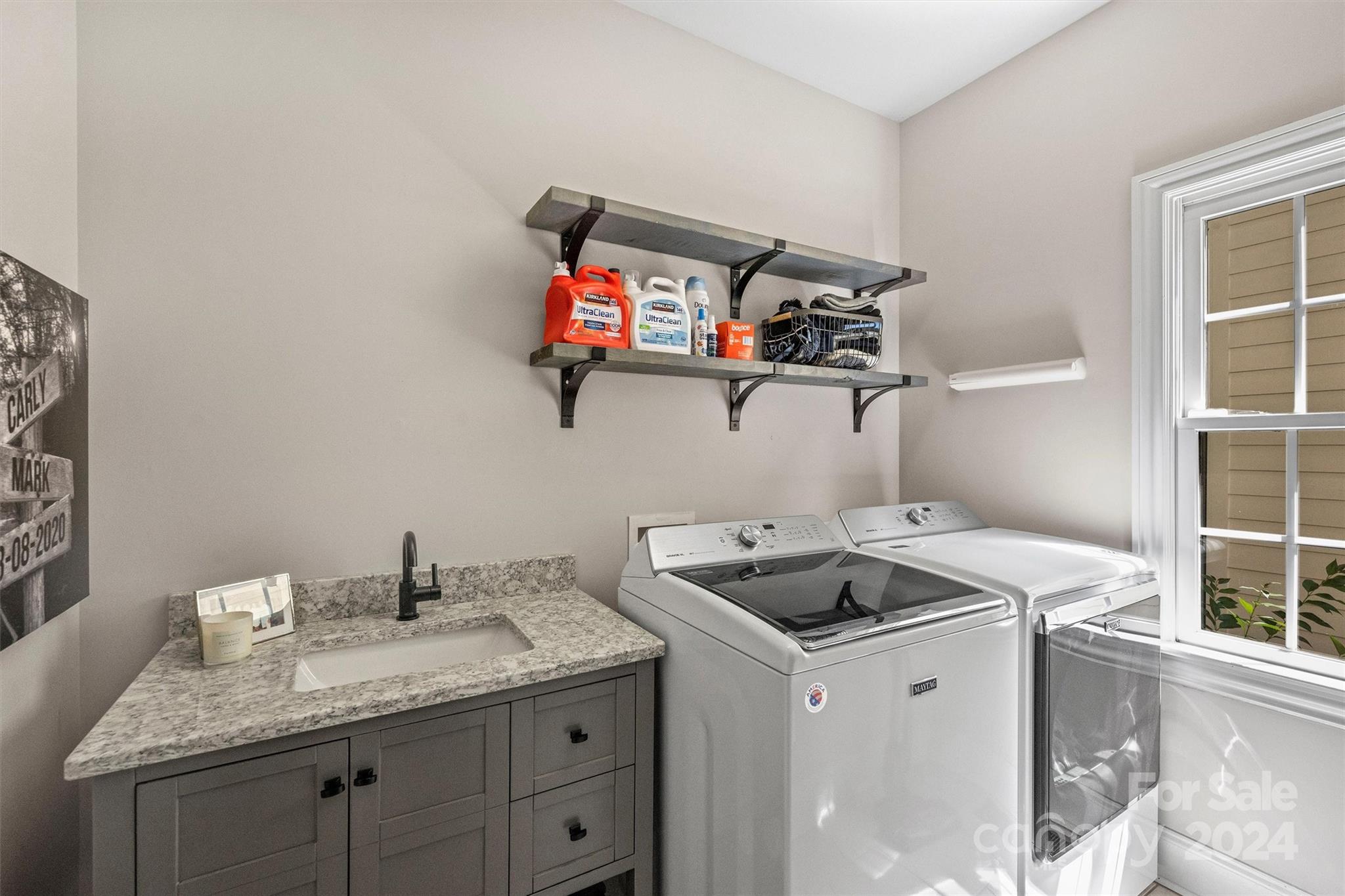 813 Millbrook Road Charlotte, NC 28211 - Photo 25 of 47 a kitchen with a sink and cabinets