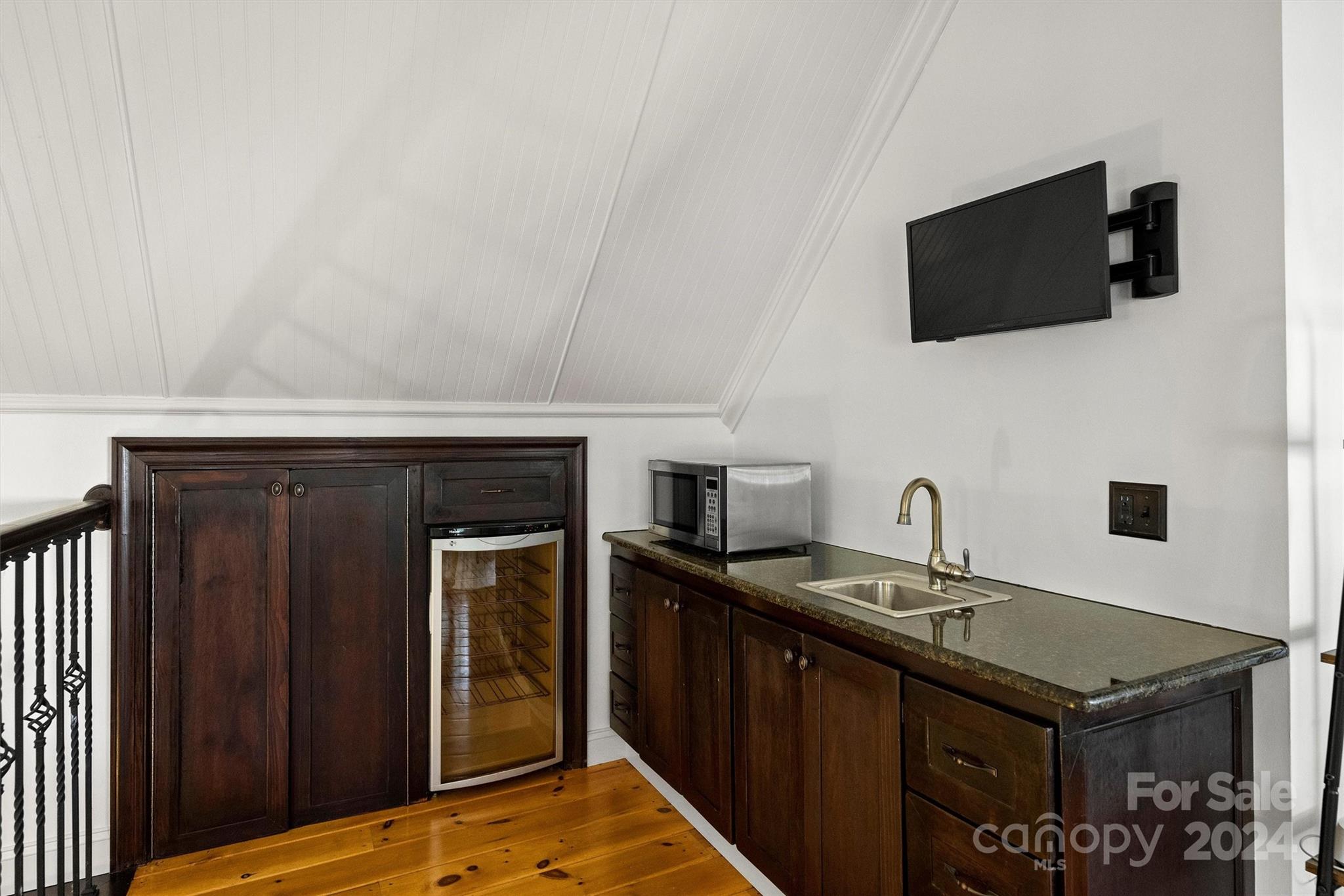 813 Millbrook Road Charlotte, NC 28211 - Photo 38 of 47 a kitchen with a sink and a refrigerator
