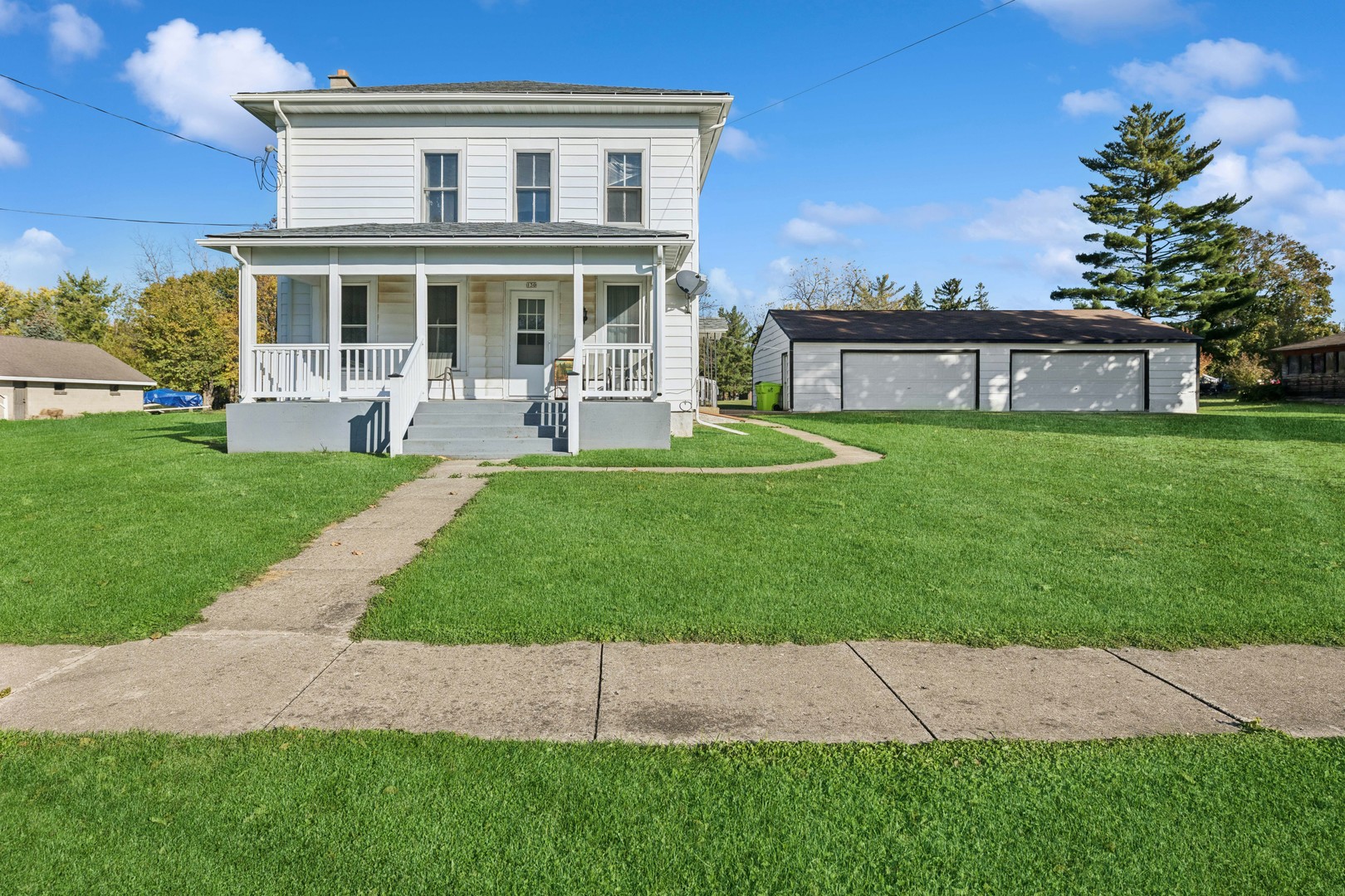 130 Seymour Street Sharon, WI 53585 - Photo 1 of 23 front view of a house with a yard
