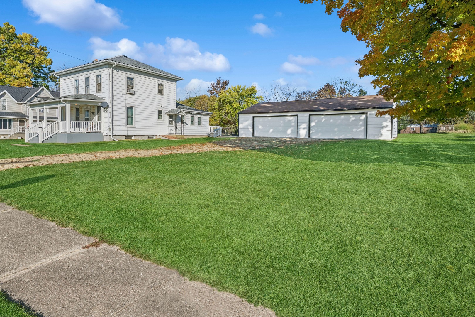 130 Seymour Street Sharon, WI 53585 - Photo 18 of 23 a view of a house with a yard