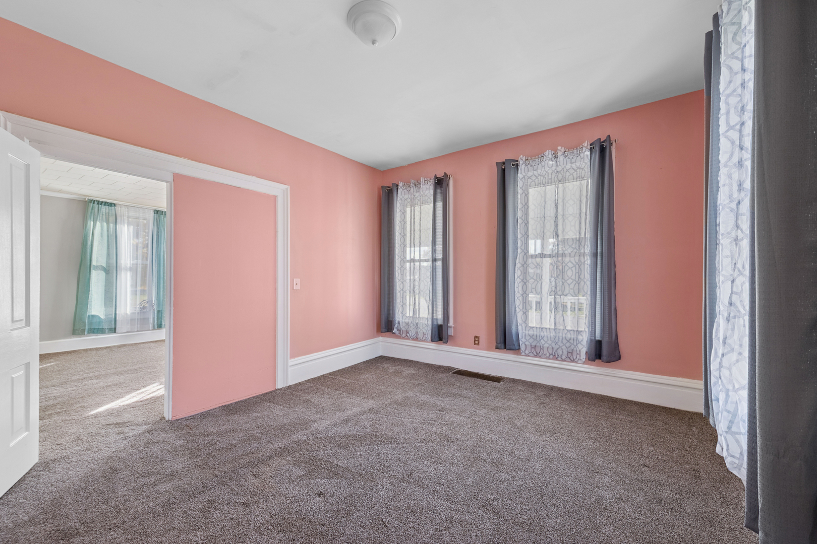 130 Seymour Street Sharon, WI 53585 - Photo 6 of 23 an empty room with windows