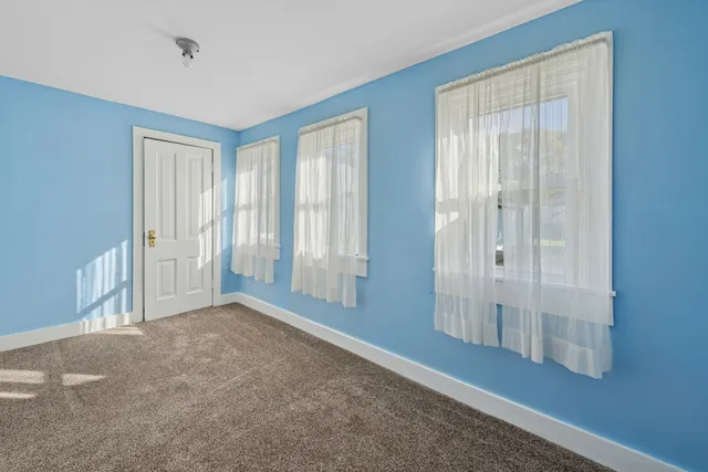 a view of an empty room with window