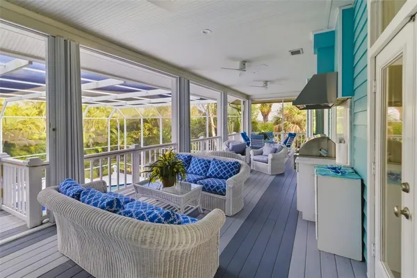 a kitchen that has a sink and a stove in it