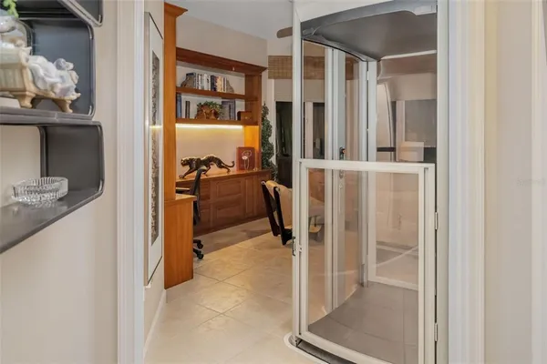 a spacious bedroom with a large bed and a large window