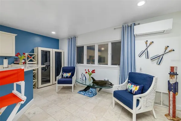 a view of living room with furniture and rug floor