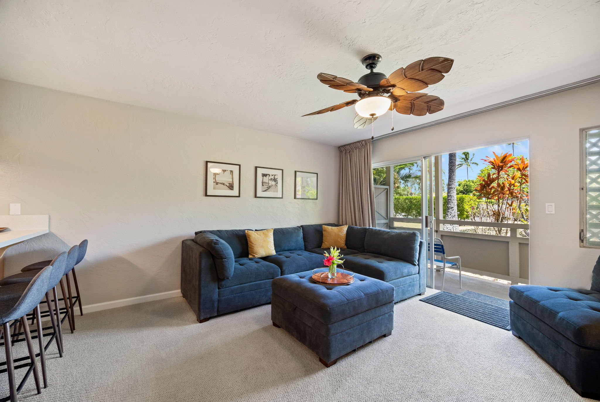 525 Aleka Loop, Unit H7 Kapaa, HI 96746 - Photo 3 of 30 a living room with furniture and a window